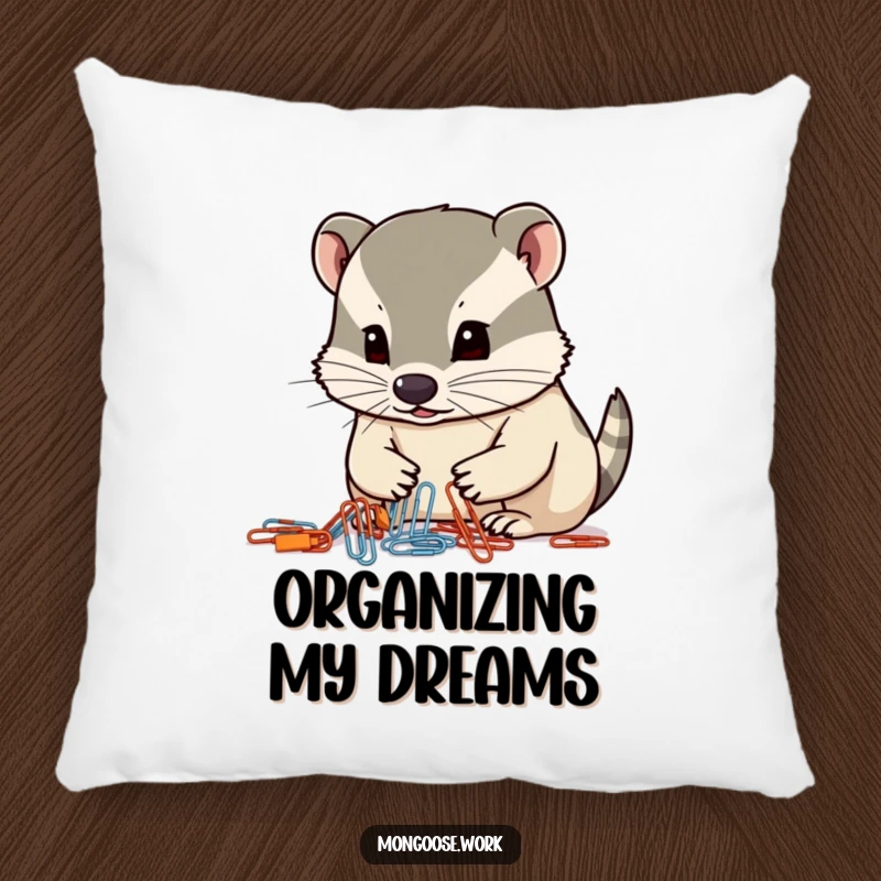 Funny mongoose pillow, a focused mongoose organizing paperclips with its nose, cozy office humor.