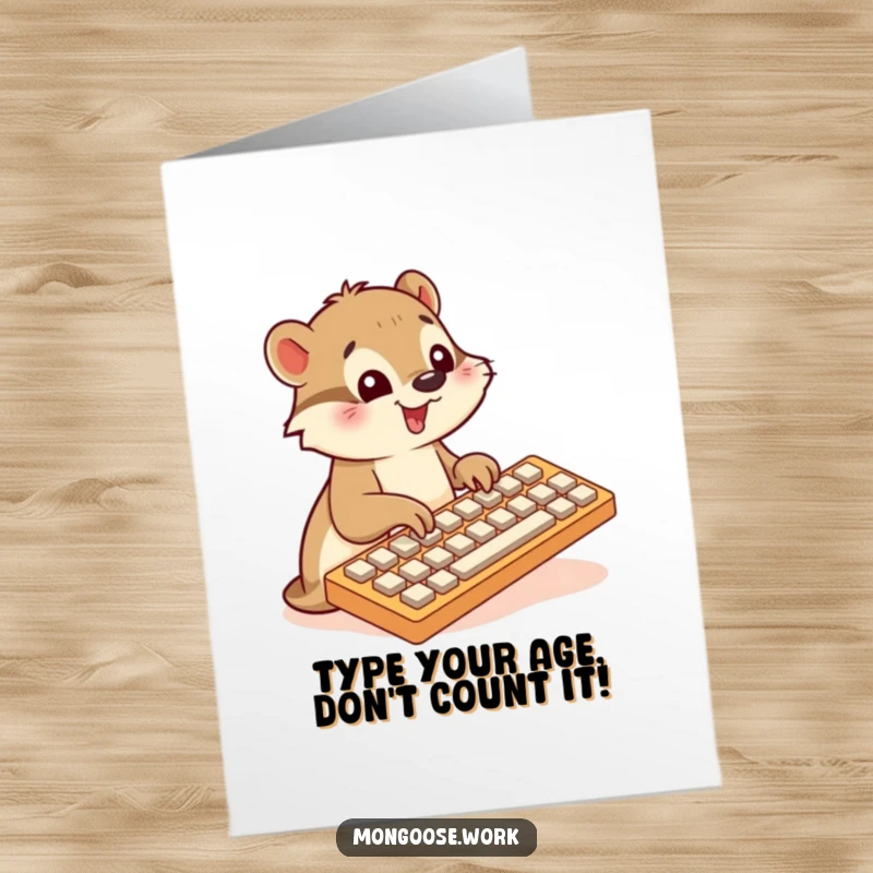 Funny Free Printable Birthday Card: A cute mongoose typing enthusiastically on a comically oversized keyboard, celebrating a birthday.
