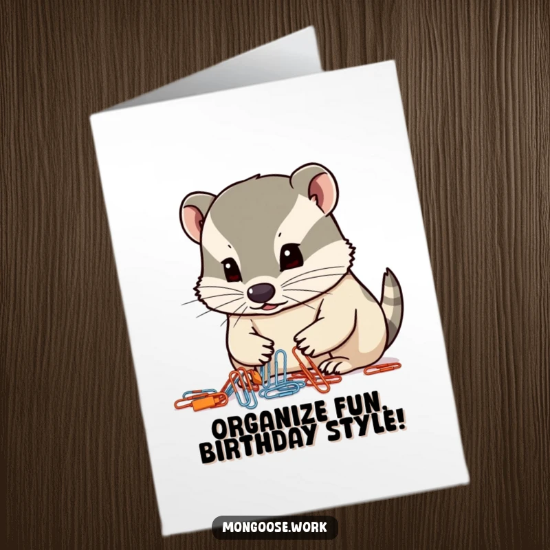 Funny Free Printable Birthday Card: Mongoose intently organizing paperclips with its nose, office humor.