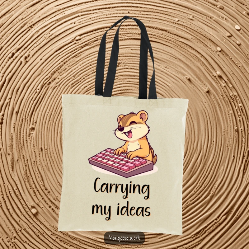Funny tote bag featuring a cute mongoose character excitedly typing on an oversized keyboard, ideal for carrying essentials.
